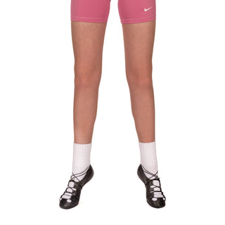 Front view of black Ava pumps with white ribbed socks and five oval eyelets