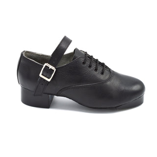 Side profile of black leather jig shoe with low block heel and instep strap