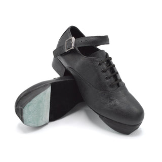 Black jig shoe sole detail showing teal toe tap and rubber base