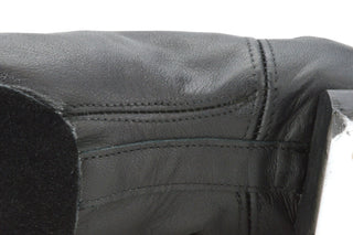 Black leather boys reel shoe side view with stitched arch seams and suede sole