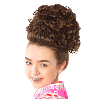 Brown loose curl bun wig on model with pink top