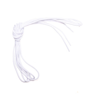 Brilliant white round Irish dance pump laces coiled on white background