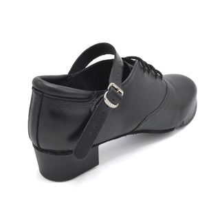 Rear view of black Irish dance shoe showing padded heel collar and silver buckle strap
