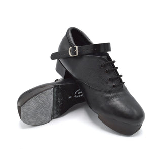 Pair of black Rutherford jig shoes crossed to display Soundblaster tap sole and size 5½