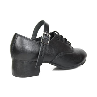 Black leather Capezio Irish dance shoe showing block heel angle and silver buckle ankle strap